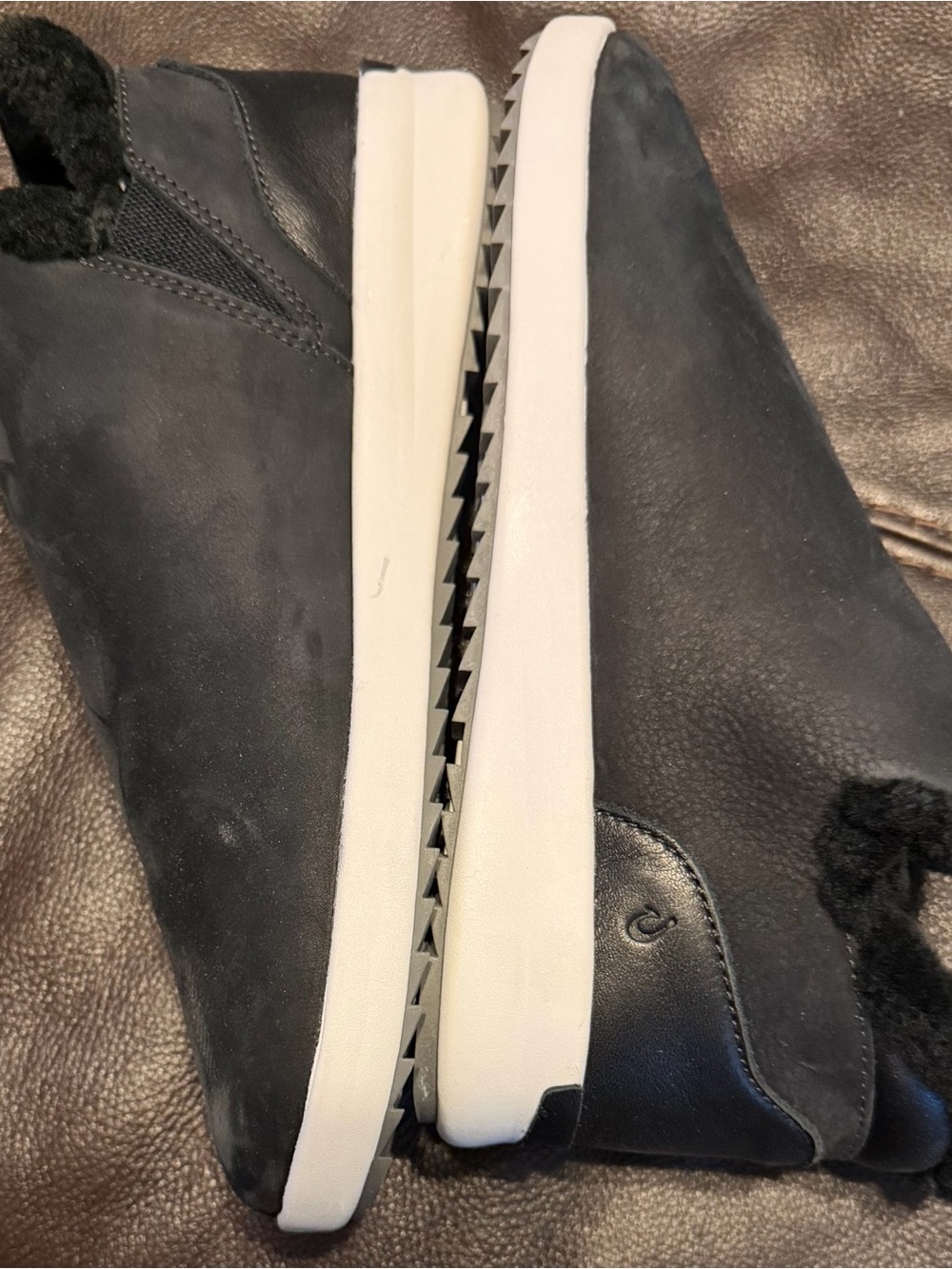 OluKai Black Slip-On Ankle Booties with White Sole